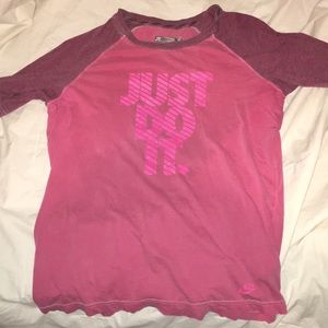 pink nike half-sleeve shirt